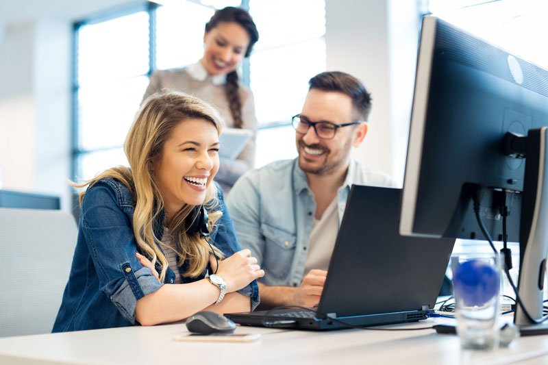 Successful business people enjoying the results of their marketing